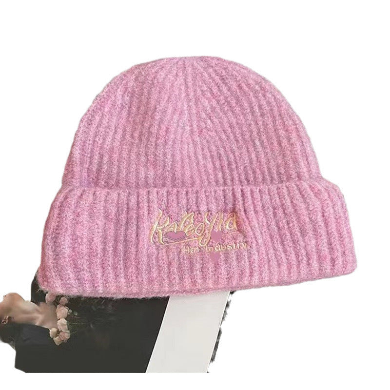 Wool hat women's autumn and winter simple knitting wide edge soft waxy surround feeling high value ear protection student style versatile