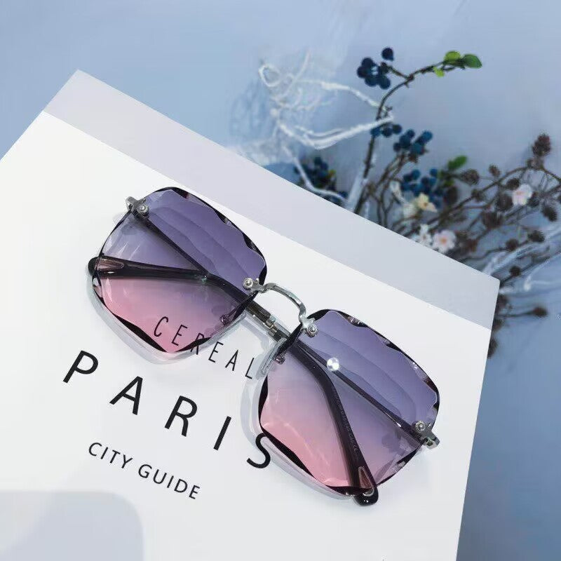 2023 new frameless trimmed sunglasses trendy women's sunscreen sunglasses show face small driving sunshade glasses