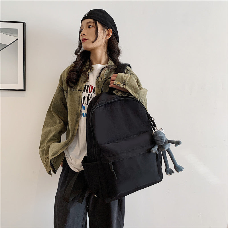 College student schoolbag simple solid color computer backpack couple versatile backpack men's large capacity backpack cross-border wholesale