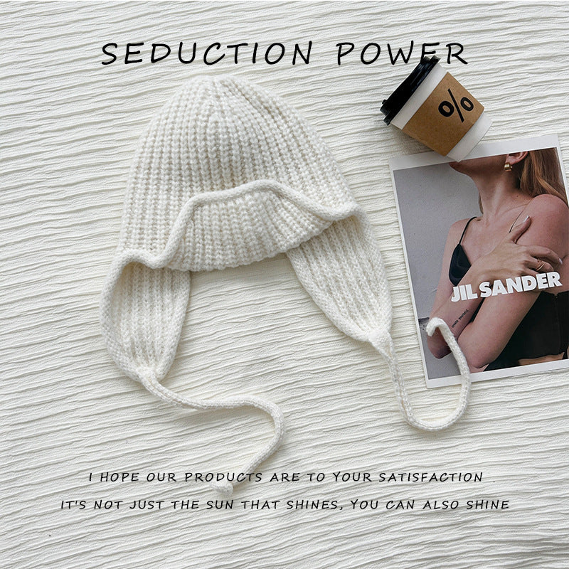 Wool hat women's autumn and winter warm fashion Korean versatile solid color simple windproof knitted hat outdoor travel ear protection