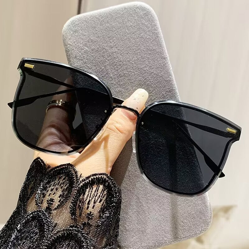 2023 new frameless trimmed sunglasses European beautiful women's fashion sunglasses high-end plain driving sunshades