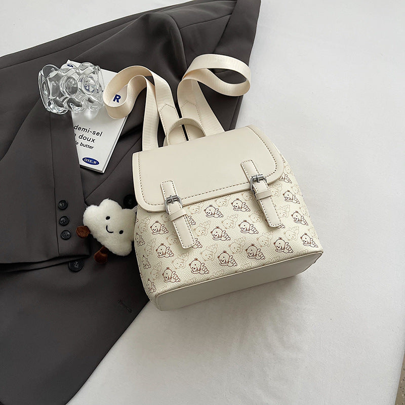 Women's bag 2024 summer new contrasting color lychee pattern casual large capacity foreign style cute pendant fashionable backpack