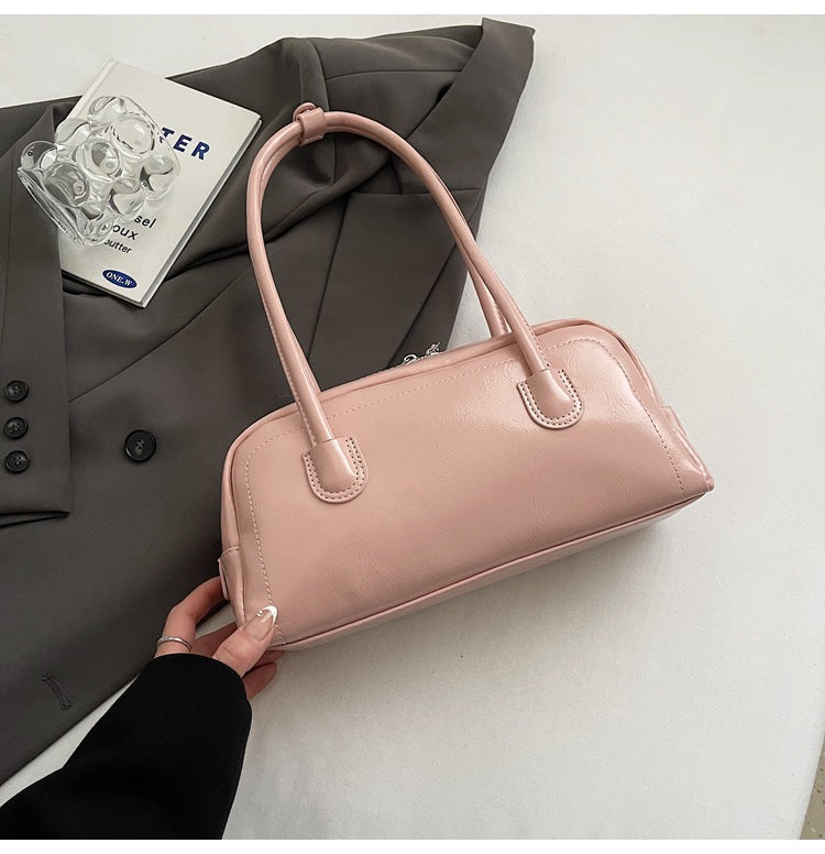 Women's bag niche portable bowling 2025 spring and summer fashion versatile shoulder bag underarm pillow bag