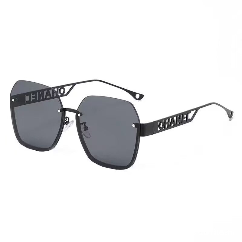 Women's fashion frameless trimmed sunglasses metal letter hollow temple trend European and American atmosphere show face small sunglasses