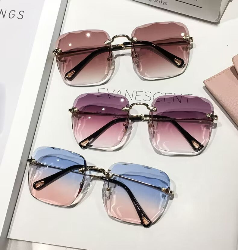 2023 new frameless trimmed sunglasses trendy women's sunscreen sunglasses show face small driving sunshade glasses