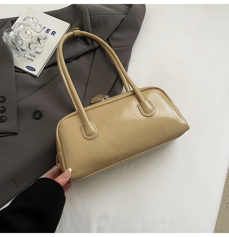 Women's bag niche portable bowling 2025 spring and summer fashion versatile shoulder bag underarm pillow bag