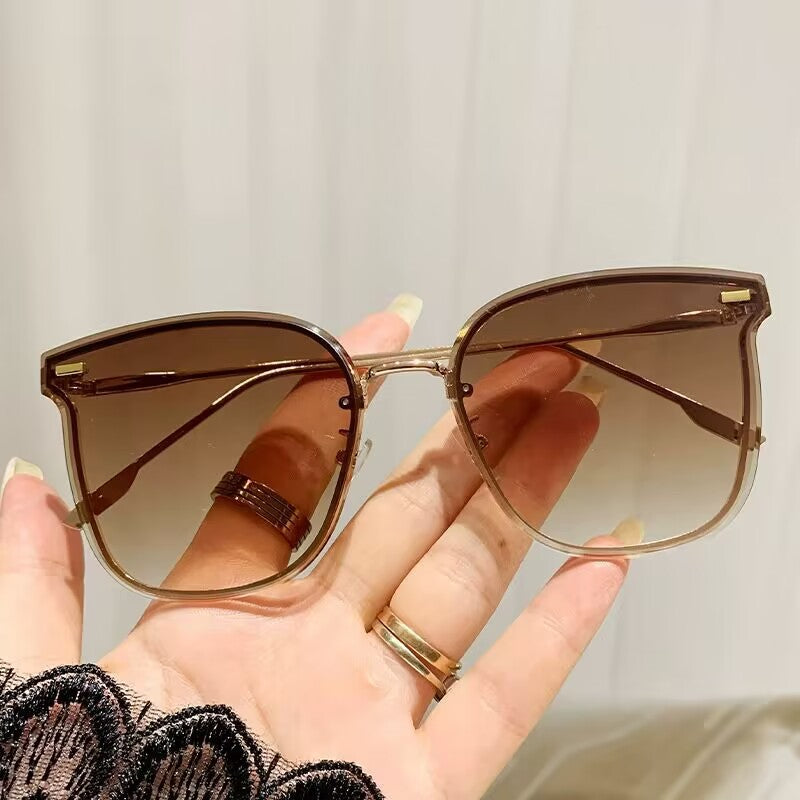 2023 new frameless trimmed sunglasses European beautiful women's fashion sunglasses high-end plain driving sunshades