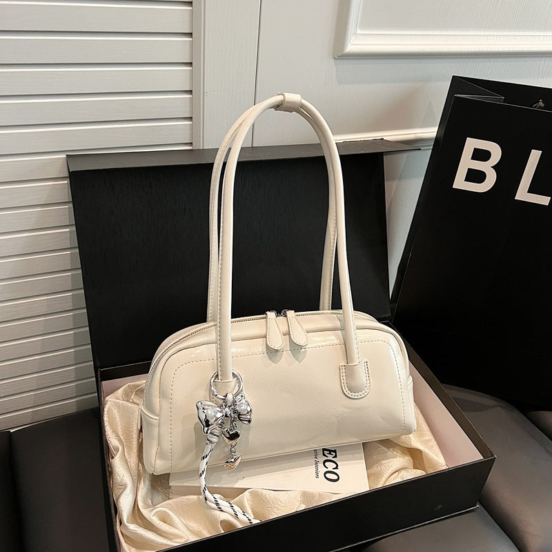 Women's bag niche portable bowling 2025 spring and summer fashion versatile shoulder bag underarm pillow bag