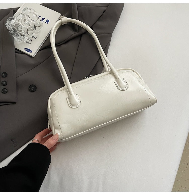 Women's bag niche portable bowling 2025 spring and summer fashion versatile shoulder bag underarm pillow bag