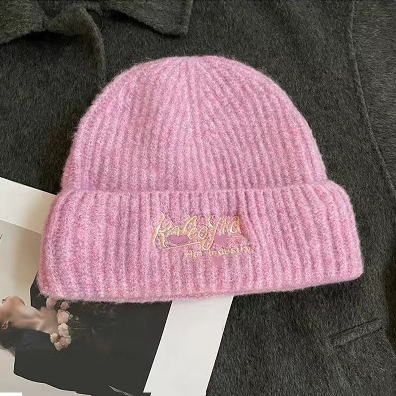 Wool hat women's autumn and winter simple knitting wide edge soft waxy surround feeling high value ear protection student style versatile