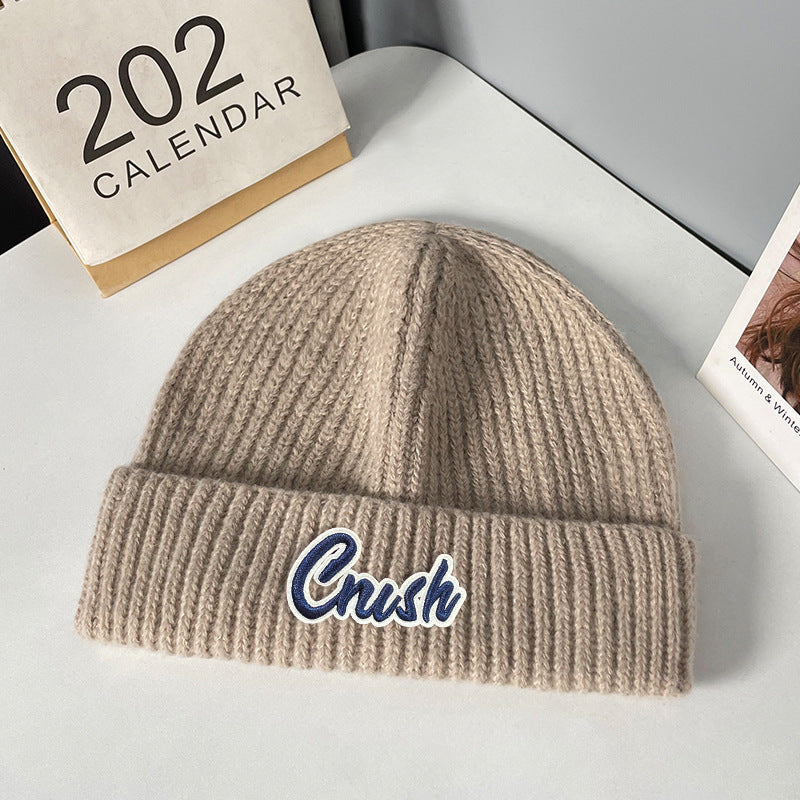 Winter letter labeling wool hat women's autumn and winter versatile warm Japanese knitted hat showing small face and ear protection cold hat man