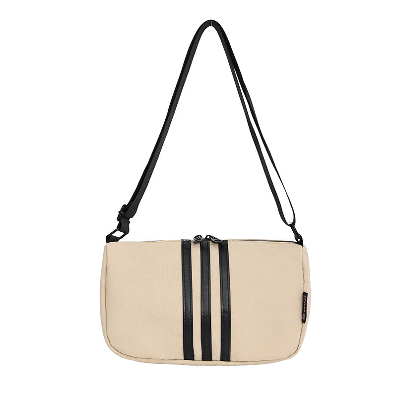 Wholesale new cross-border high-end Oxford cloth shoulder bag fashion trendy brand three-bar women's armpit bag messenger bag