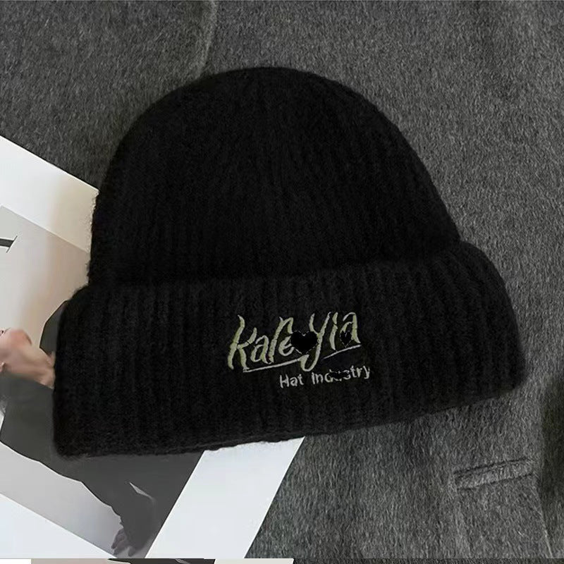 Wool hat women's autumn and winter simple knitting wide edge soft waxy surround feeling high value ear protection student style versatile