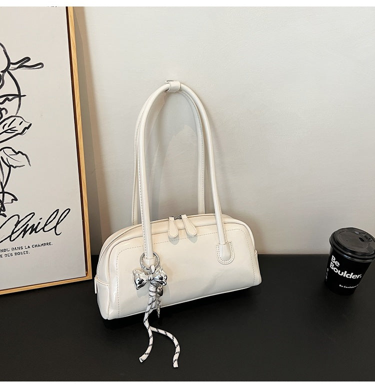 Women's bag niche portable bowling 2025 spring and summer fashion versatile shoulder bag underarm pillow bag