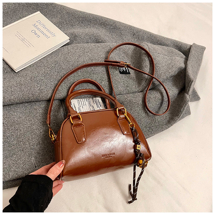 Winter new 2024 niche retro trendy portable small square bag fashionable and casual single shoulder oblique cross-ocean bag women's bag