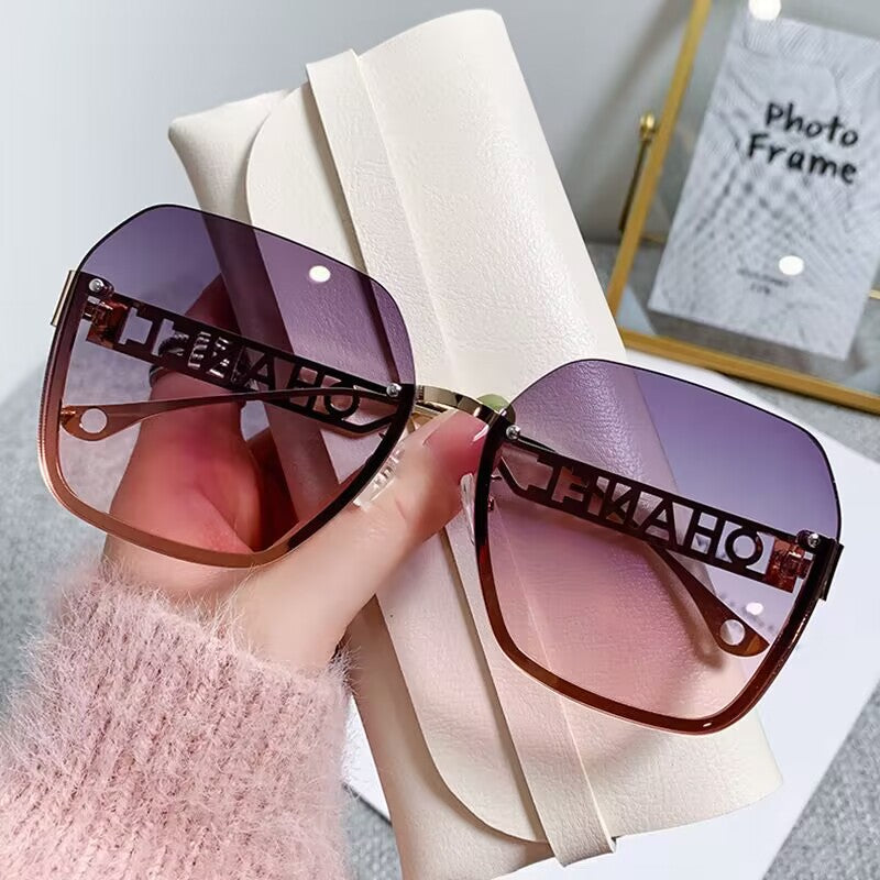 Women's fashion frameless trimmed sunglasses metal letter hollow temple trend European and American atmosphere show face small sunglasses