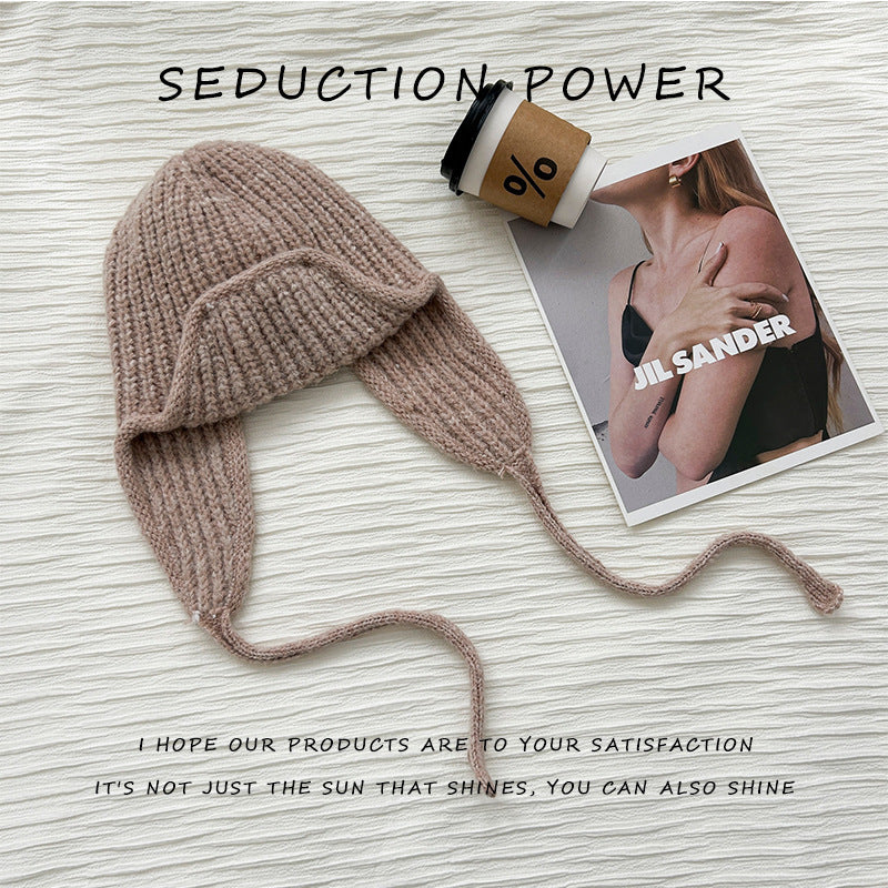 Wool hat women's autumn and winter warm fashion Korean versatile solid color simple windproof knitted hat outdoor travel ear protection