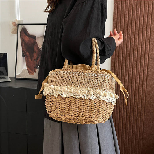 Wenyi style hand-woven straw bag 2025 new fashion seaside vacation lace large-capacity strap handbag