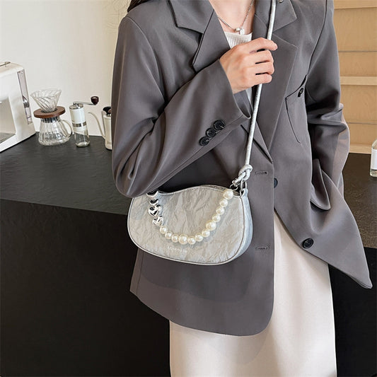 Women's small bag 2024 new fashion foreign style shoulder messenger bag women's texture Korean version of pearl chain small square bag