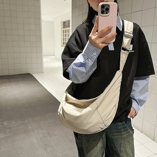 Wholesale large-capacity bags, women's casual dumpling bags, simple and lightweight shoulder bags, trendy versatile commuter messenger bags