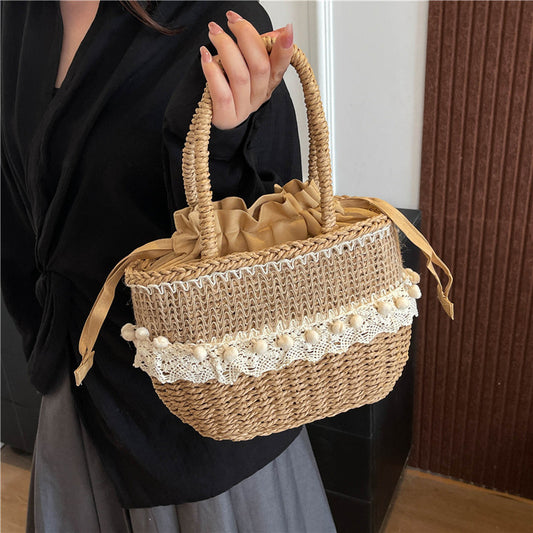 Wenyi style hand-woven straw bag 2025 new fashion seaside vacation lace large-capacity strap handbag