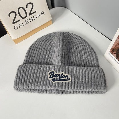 Winter letter labeling wool hat women's autumn and winter versatile warm Japanese knitted hat showing small face and ear protection cold hat man