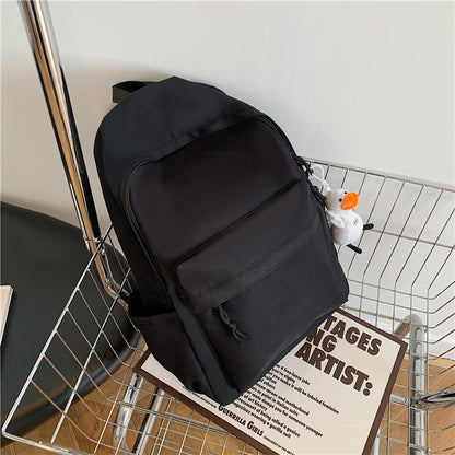 College student schoolbag simple solid color computer backpack couple versatile backpack men's large capacity backpack cross-border wholesale