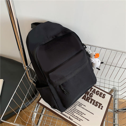 College student schoolbag simple solid color computer backpack couple versatile backpack men's large capacity backpack cross-border wholesale
