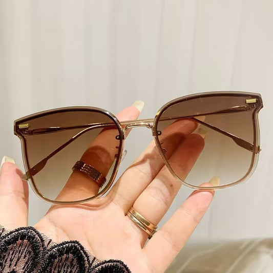 2023 new frameless trimmed sunglasses European beautiful women's fashion sunglasses high-end plain driving sunshades