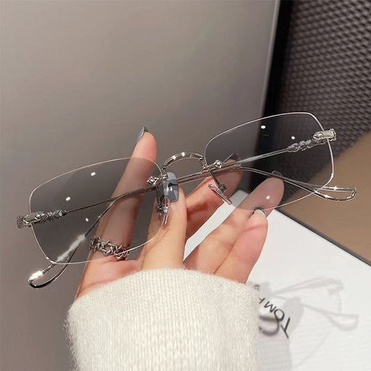 Color-changing eye protection rimless glasses plain face high-end new anti-blue glasses women's rimless frame Sven men's wholesale