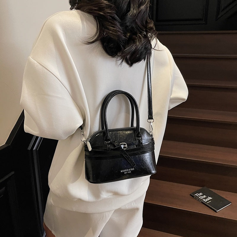 Premium texture handbag women's 2025 spring and summer new retro versatile shoulder bag foreign style versatile messenger shell bag