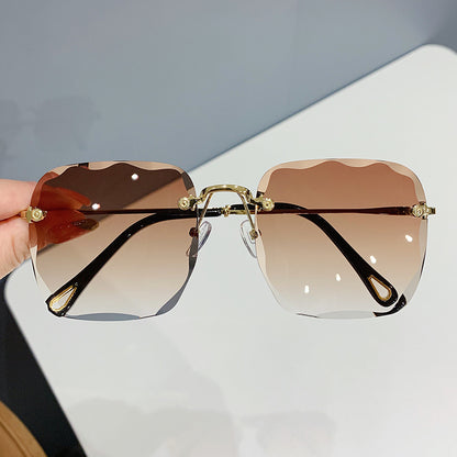 2022 new frameless trimmed square sunglasses women, Korean version of Internet celebrity round face plain sunglasses gradual change