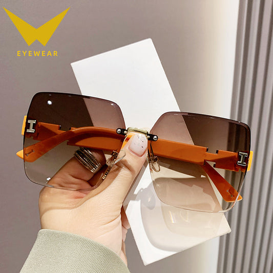 2023 new frameless two-color gradual change high-end women's trend driving sunglasses fashion sunglasses wholesale factory