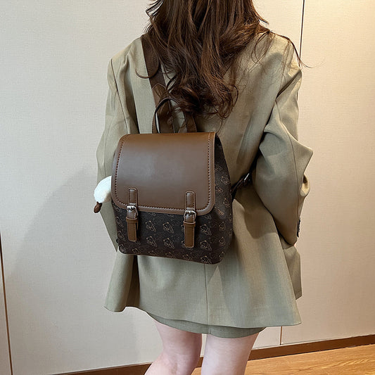 Women's bag 2024 summer new contrasting color lychee pattern casual large capacity foreign style cute pendant fashionable backpack