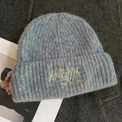 Wool hat women's autumn and winter simple knitting wide edge soft waxy surround feeling high value ear protection student style versatile