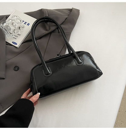 Women's bag niche portable bowling 2025 spring and summer fashion versatile shoulder bag underarm pillow bag