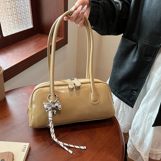 Women's bag niche portable bowling 2025 spring and summer fashion versatile shoulder bag underarm pillow bag