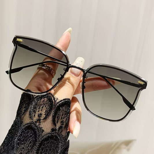 2023 new frameless trimmed sunglasses European beautiful women's fashion sunglasses high-end plain driving sunshades
