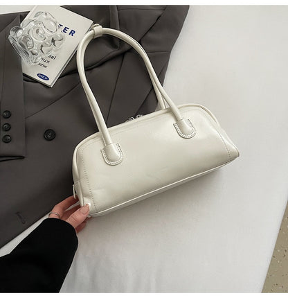 Women's bag niche portable bowling 2025 spring and summer fashion versatile shoulder bag underarm pillow bag