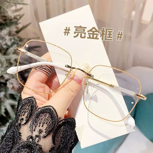 2023 fashion trendy frameless gold powder design high sense anti-blue glasses women's Internet celebrity flat glasses wholesale