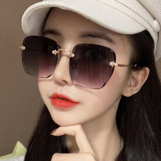 2022 new frameless trimmed square sunglasses women, Korean version of Internet celebrity round face plain sunglasses gradual change