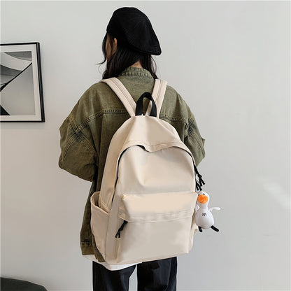 College student schoolbag simple solid color computer backpack couple versatile backpack men's large capacity backpack cross-border wholesale