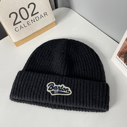 Winter letter labeling wool hat women's autumn and winter versatile warm Japanese knitted hat showing small face and ear protection cold hat man
