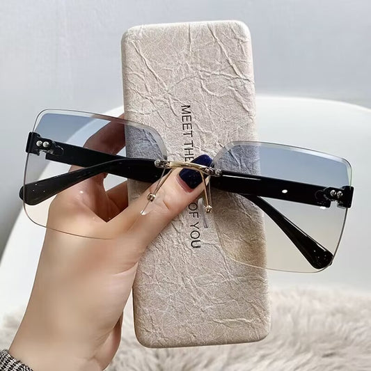 2023 new frameless trimmed sunglasses large box high-end street sunglasses UV-proof summer sunshades