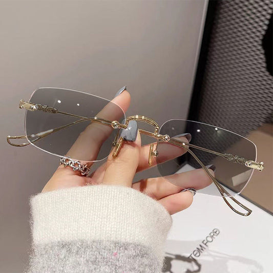 Color-changing eye protection rimless glasses plain face high-end new anti-blue glasses women's rimless frame Sven men's wholesale